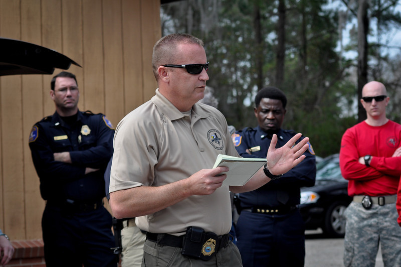SWAT Member Speaking to a Team