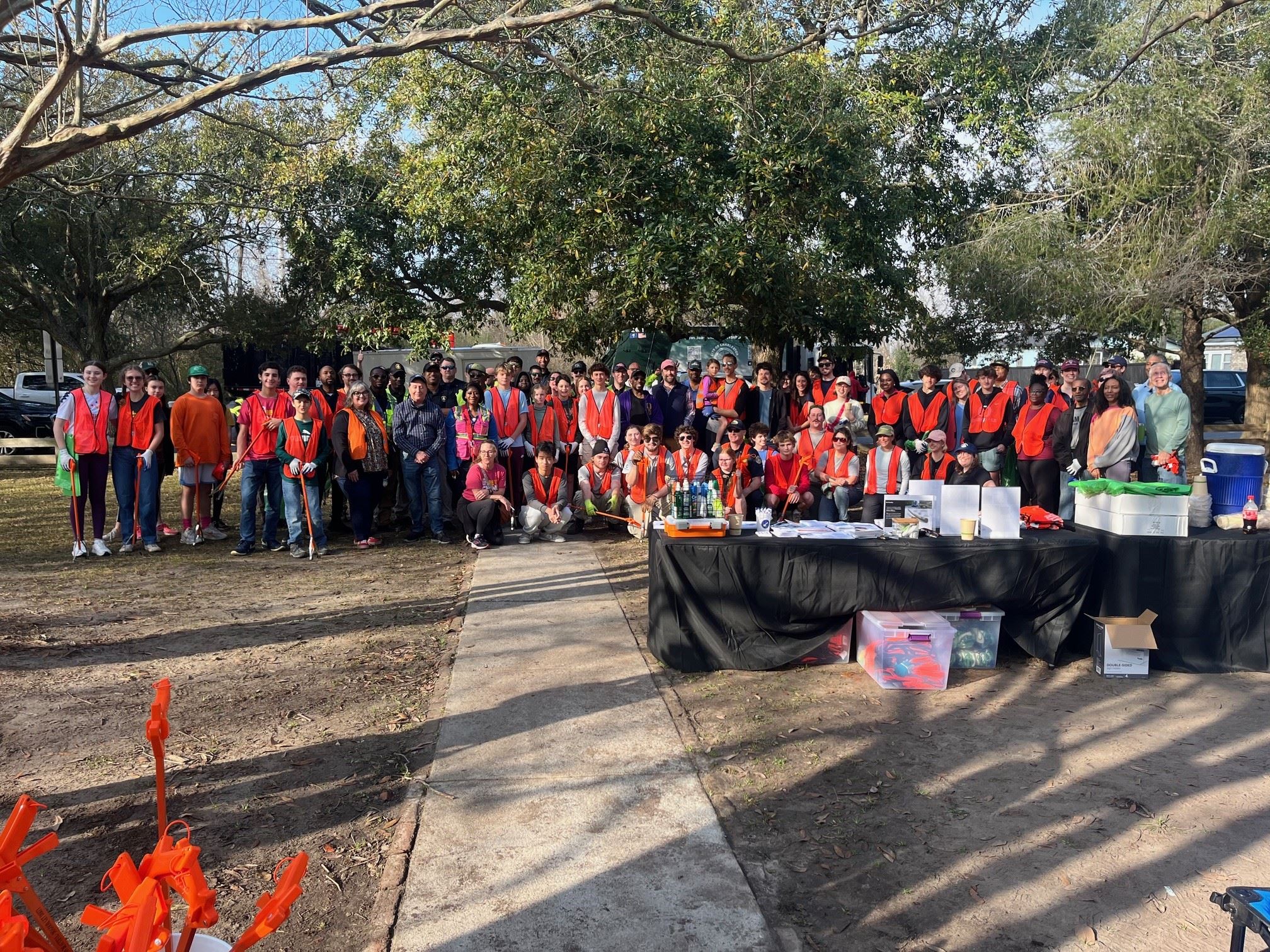 Photo of staff and volunteers before neighborhood cleanup in Rosemont.